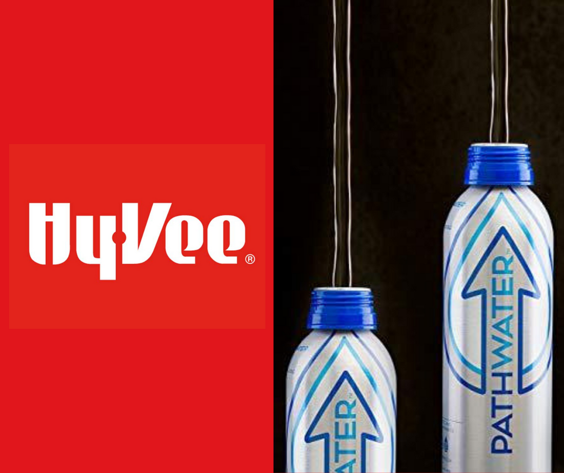 HyVee logo beside two PATHWATER aluminum bottles, one small and one large, with water pouring on a dark background