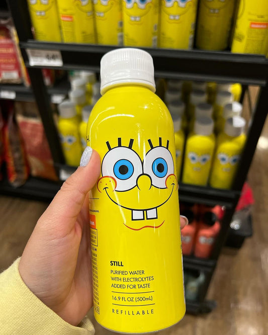 Front view of PATH 16.9 fl oz 500 mL reusable water bottle with SpongeBob SquarePants face and Still label on store shelf