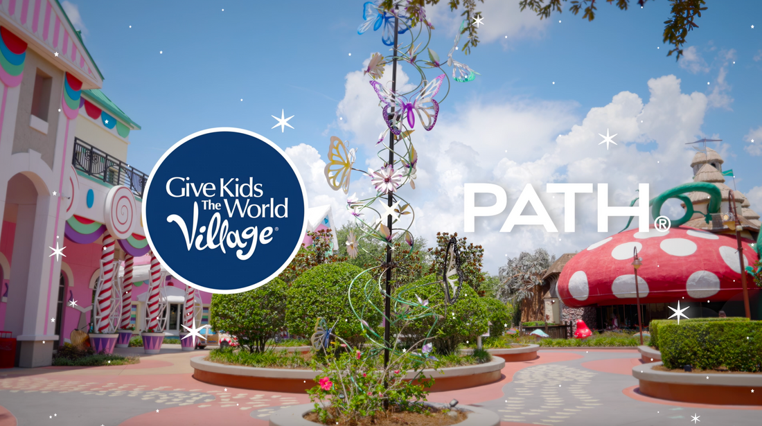 Give Kids The World Village circular logo and PATH wordmark over a colorful theme-park courtyard with mushroom-shaped building